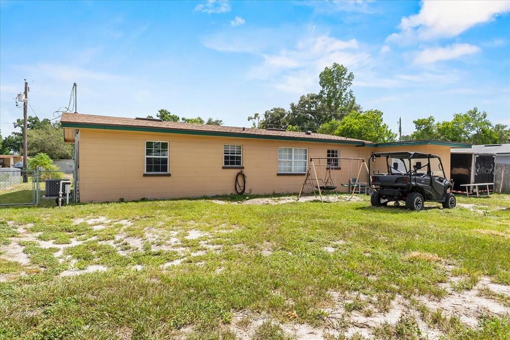 113 4th Street Winter Haven, FL 33880 - Photo 7 of 35 a view of an house with backyard space and garden