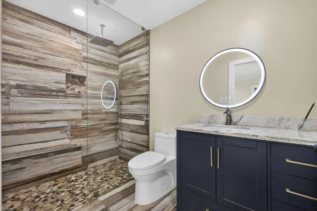 a view of backyard with tub