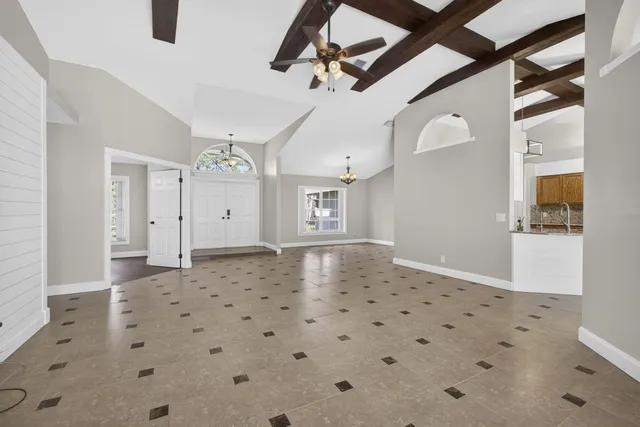 a view of a hallway with a chandelier