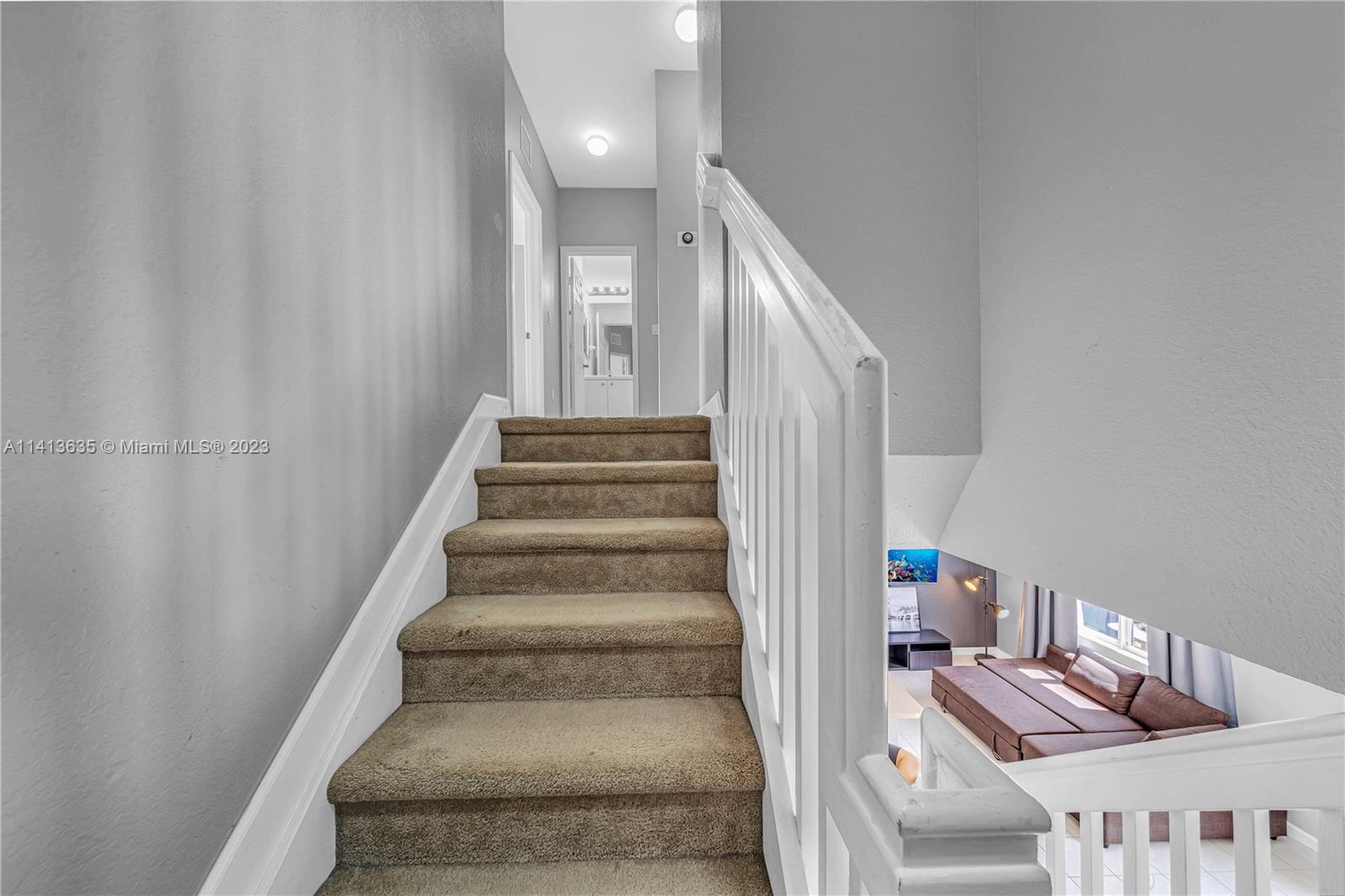 949 Northeast 42nd Avenue Homestead, FL 33033 - Photo 10 of 22 a view of entryway and hall with wooden floor