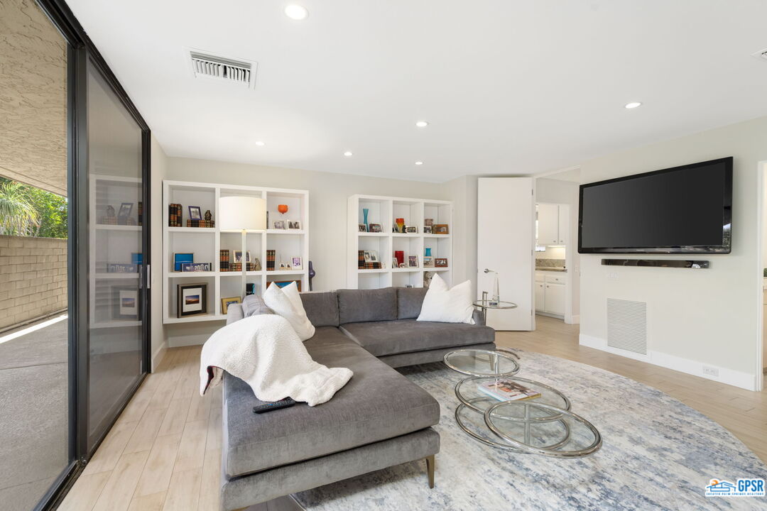 78 Colgate Drive Rancho Mirage, CA 92270 - Photo 18 of 56 a living room with furniture and a flat screen tv
