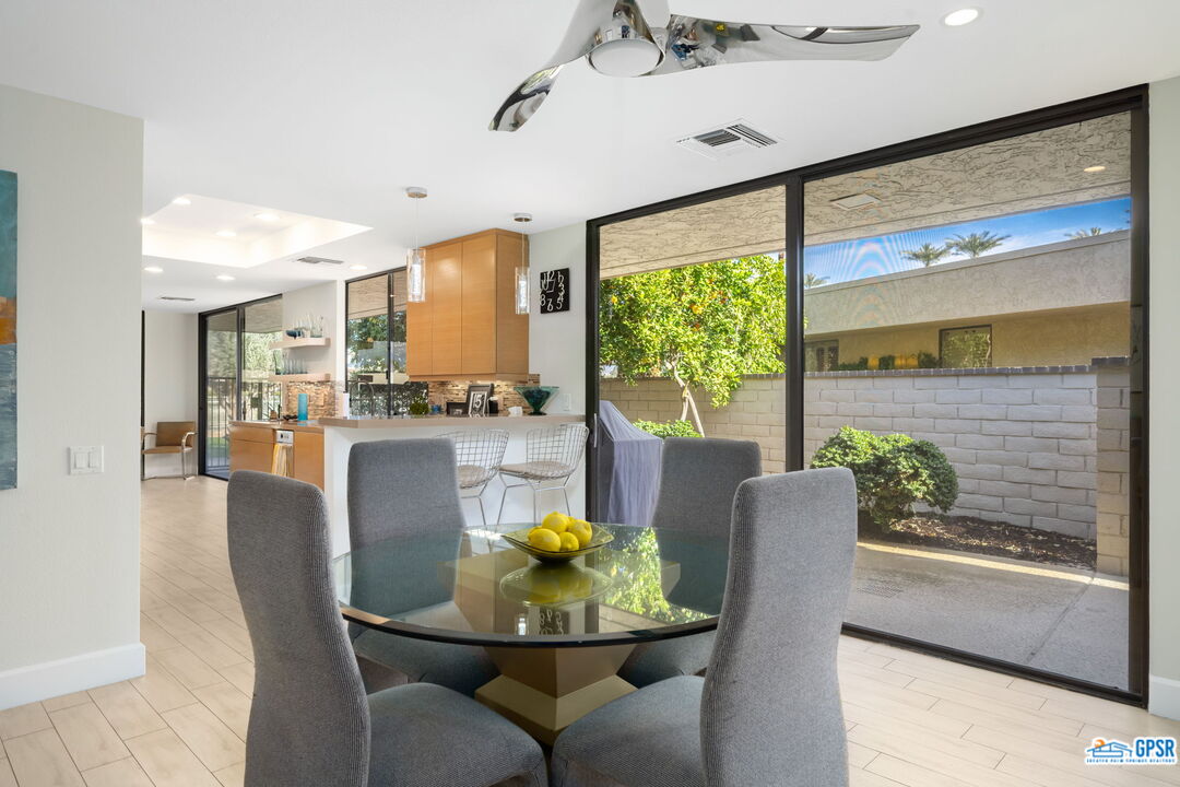 78 Colgate Drive Rancho Mirage, CA 92270 - Photo 20 of 56 a dining room with furniture and a large window