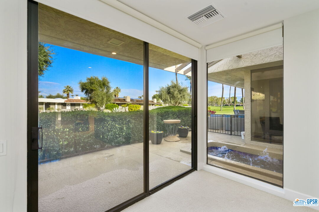 78 Colgate Drive Rancho Mirage, CA 92270 - Photo 23 of 56 a bathroom with a glass shower door