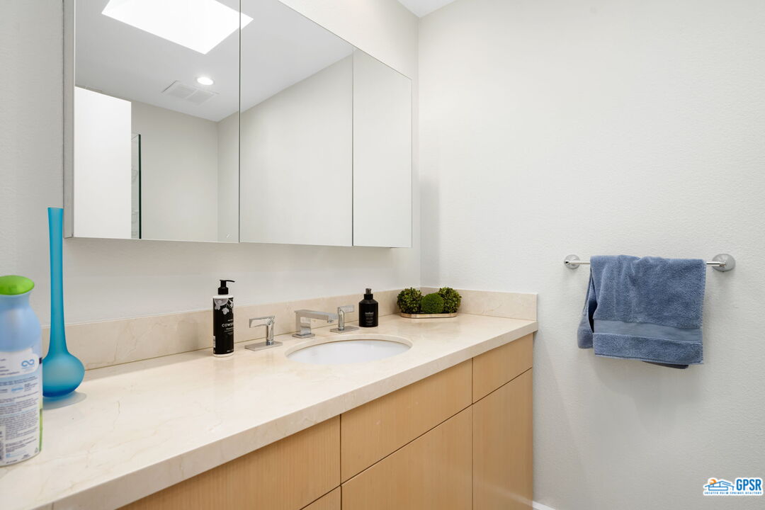 78 Colgate Drive Rancho Mirage, CA 92270 - Photo 31 of 56 a kitchen with a sink and cabinets