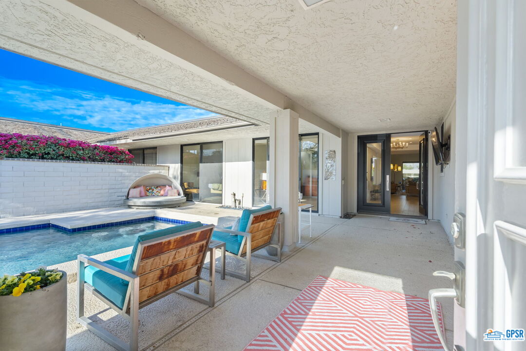 78 Colgate Drive Rancho Mirage, CA 92270 - Photo 32 of 56 a view of living room with furniture and rug