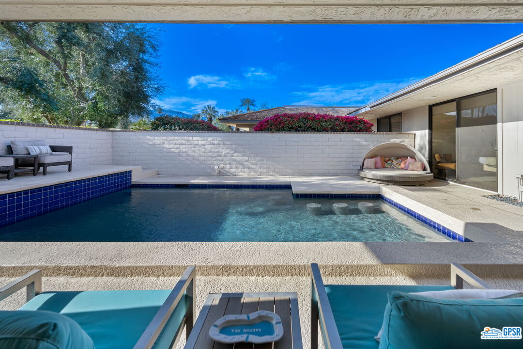 78 Colgate Drive Rancho Mirage, CA 92270 - Photo 34 of 56 a view of living room with furniture and a fireplace