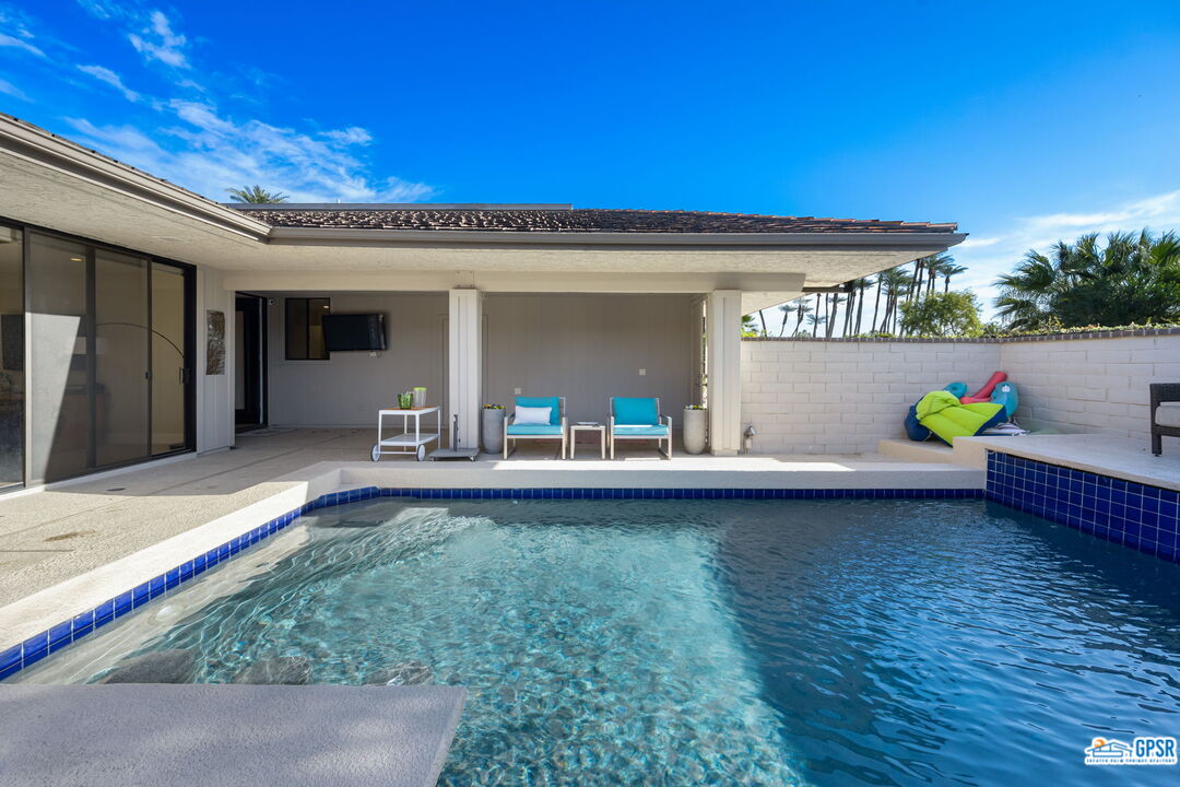 78 Colgate Drive Rancho Mirage, CA 92270 - Photo 36 of 56 a front view of a house with garden