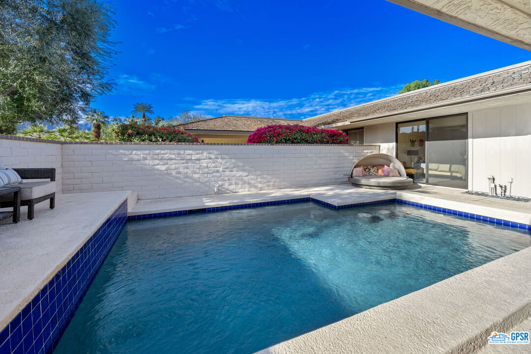 78 Colgate Drive Rancho Mirage, CA 92270 - Photo 40 of 56 a view of a lake with a big yard