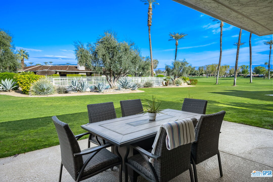 78 Colgate Drive Rancho Mirage, CA 92270 - Photo 41 of 56 a view of a patio with a table chairs and a table