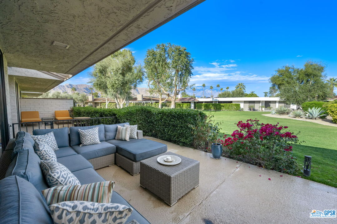 78 Colgate Drive Rancho Mirage, CA 92270 - Photo 42 of 56 a view of a patio with couches table and chairs with plants