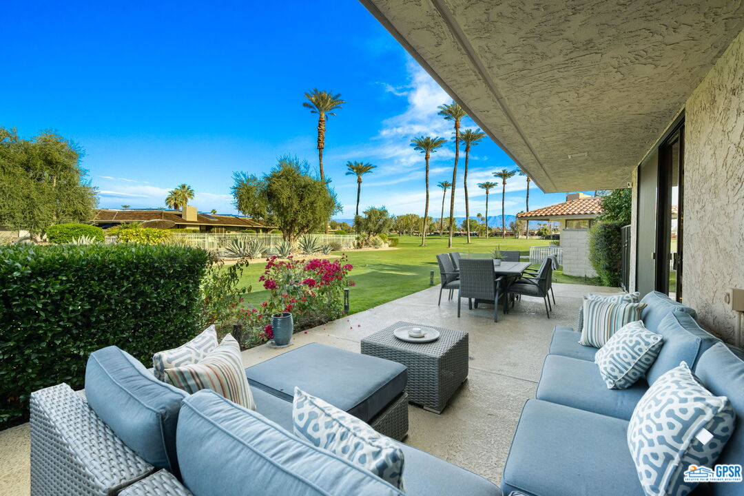 78 Colgate Drive Rancho Mirage, CA 92270 - Photo 43 of 56 a view of a patio with couches table and chairs and potted plants