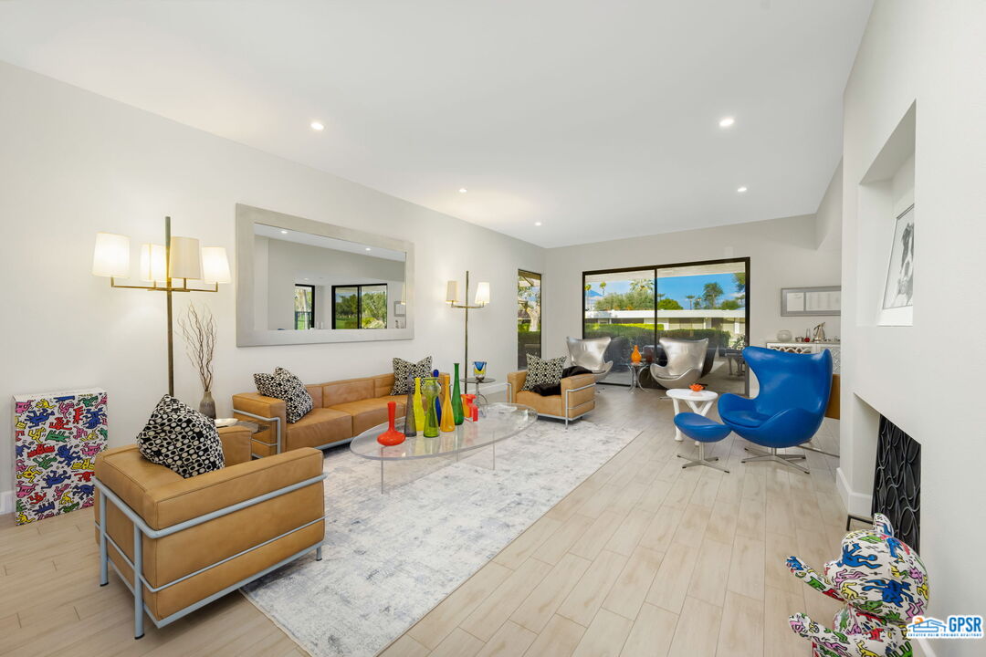 78 Colgate Drive Rancho Mirage, CA 92270 - Photo 6 of 56 a living room filled with furniture and a flat screen tv