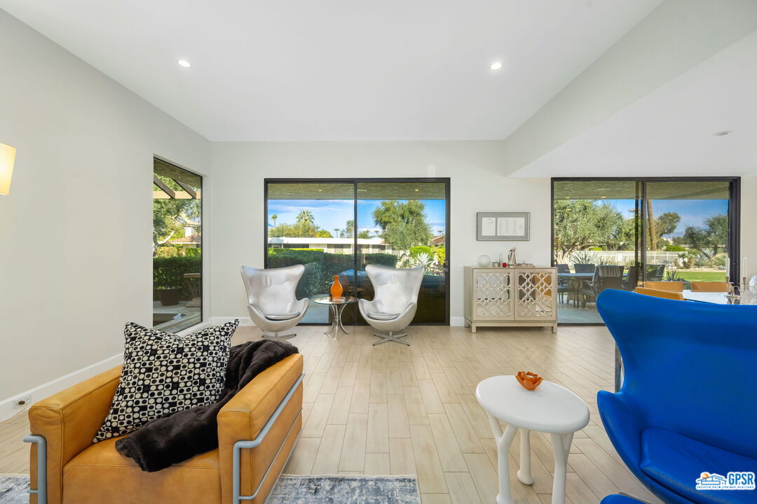 78 Colgate Drive Rancho Mirage, CA 92270 - Photo 8 of 56 a living room with furniture and a large window