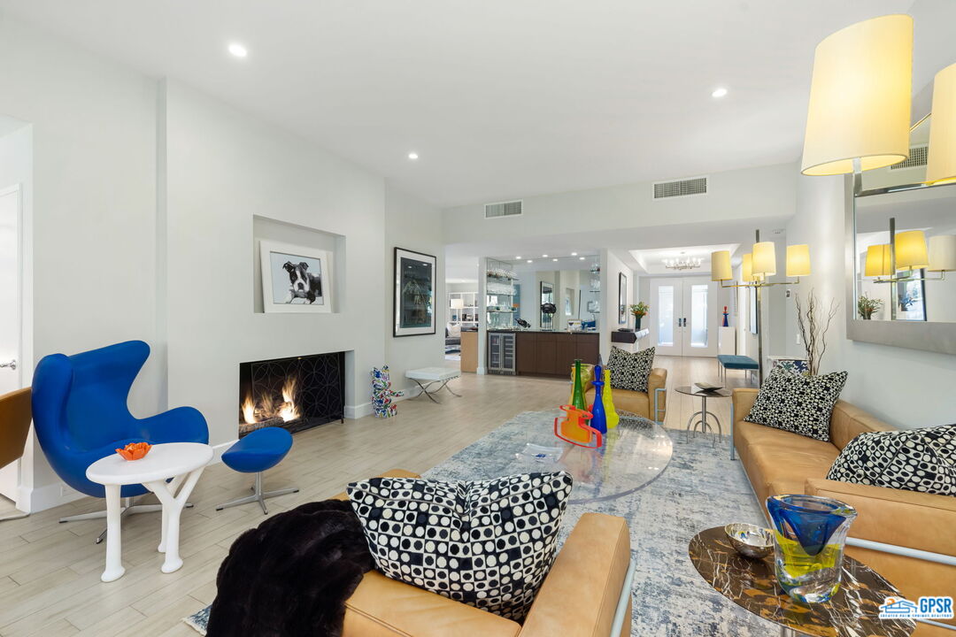 78 Colgate Drive Rancho Mirage, CA 92270 - Photo 9 of 56 a living room with furniture and a fireplace