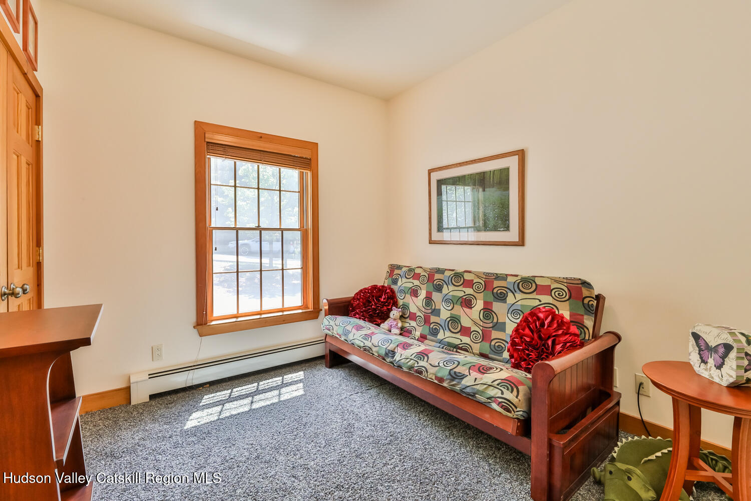 37 White Way Windham, NY 12496 - Photo 29 of 71 a bed sitting in a bedroom next to a window
