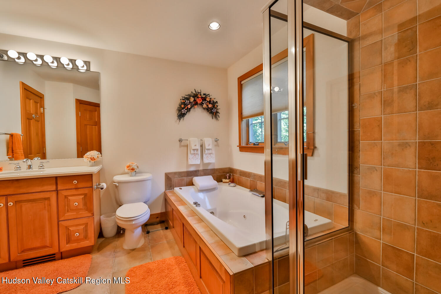 37 White Way Windham, NY 12496 - Photo 39 of 71 a bathroom with a tub sink toilet and mirror