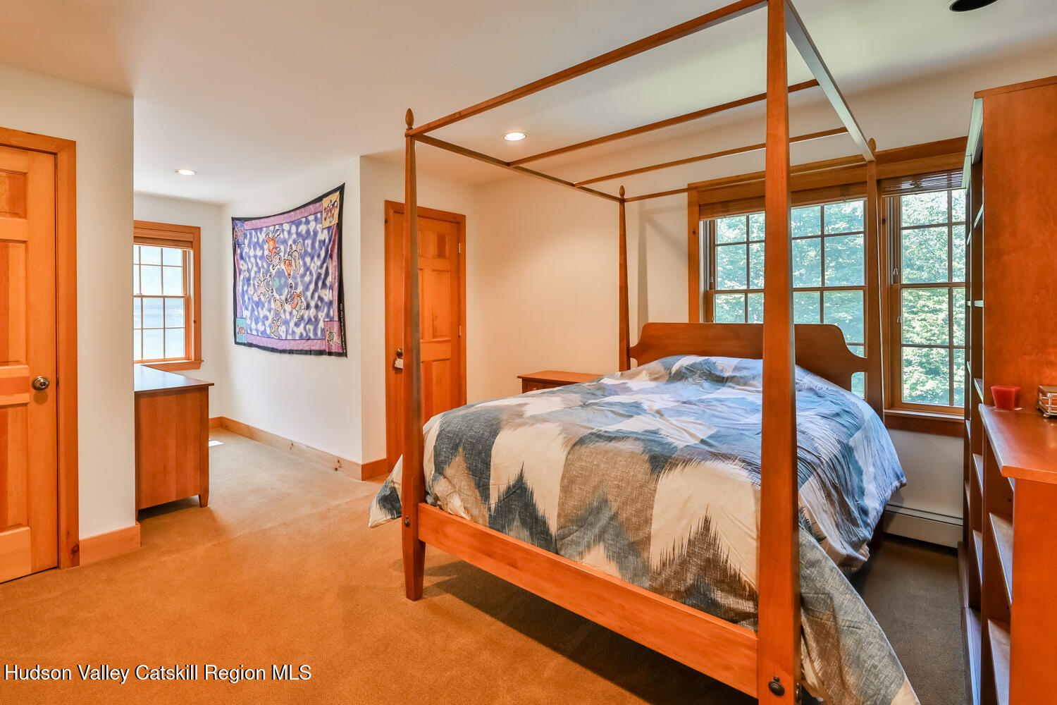 37 White Way Windham, NY 12496 - Photo 49 of 101 a bed sitting in a bedroom next to a window