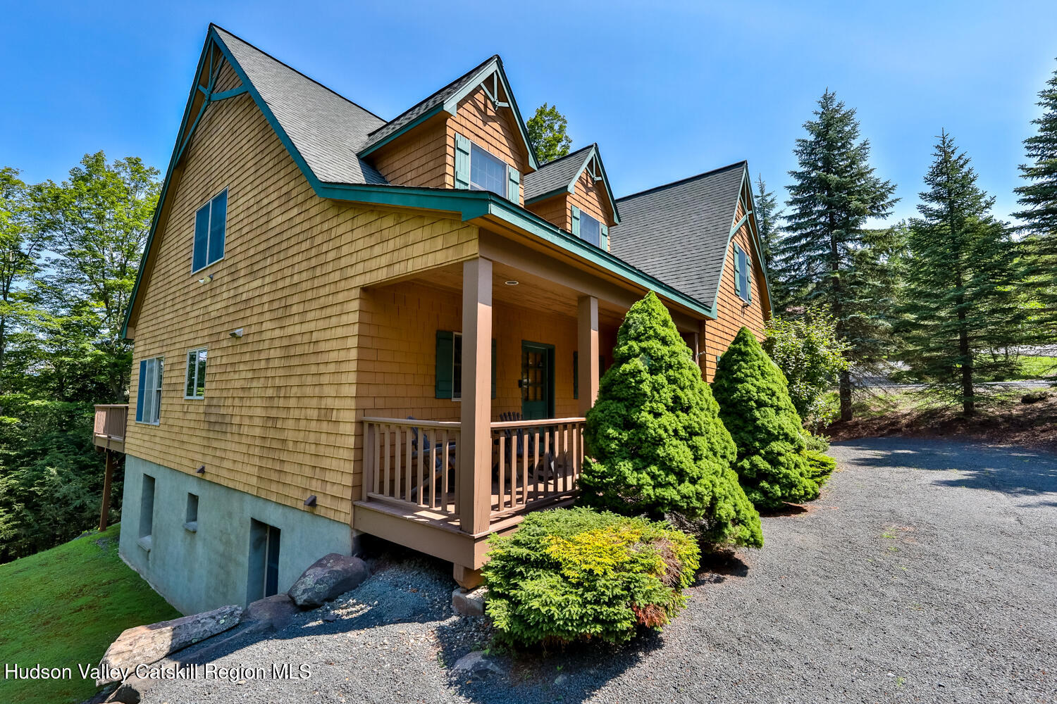 37 White Way Windham, NY 12496 - Photo 62 of 71 a view of a house with wooden fence and potted plants