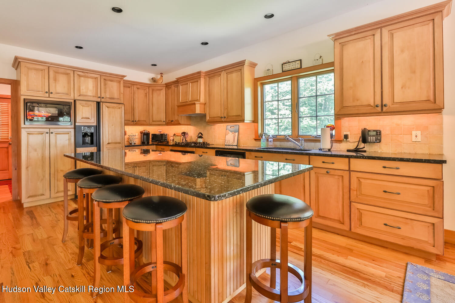 37 White Way Windham, NY 12496 - Photo 7 of 71 a kitchen with stainless steel appliances granite countertop a stove and a sink
