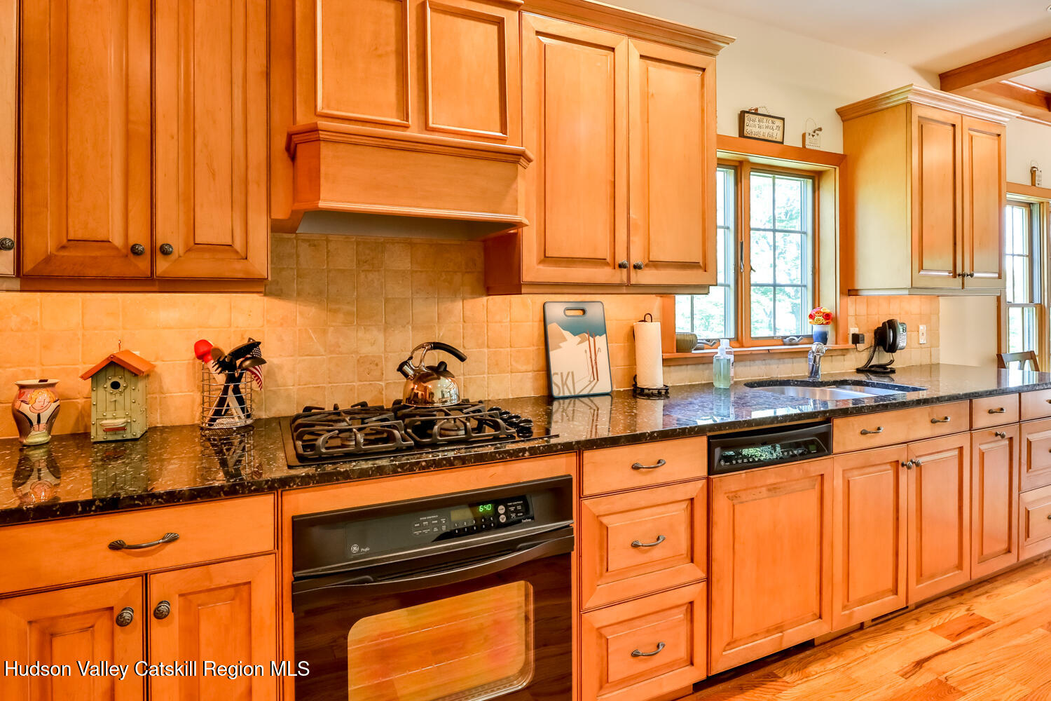 37 White Way Windham, NY 12496 - Photo 9 of 71 a kitchen with stainless steel appliances granite countertop a sink a stove and cabinets