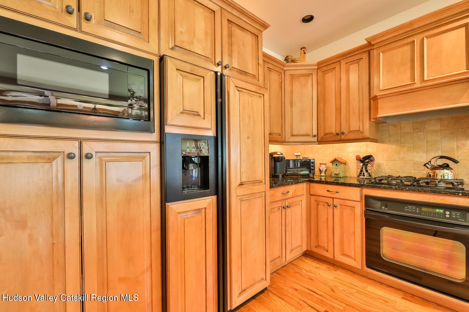 37 White Way Windham, NY 12496 - Photo 10 of 71 a kitchen with stainless steel appliances granite countertop a refrigerator and a stove top oven