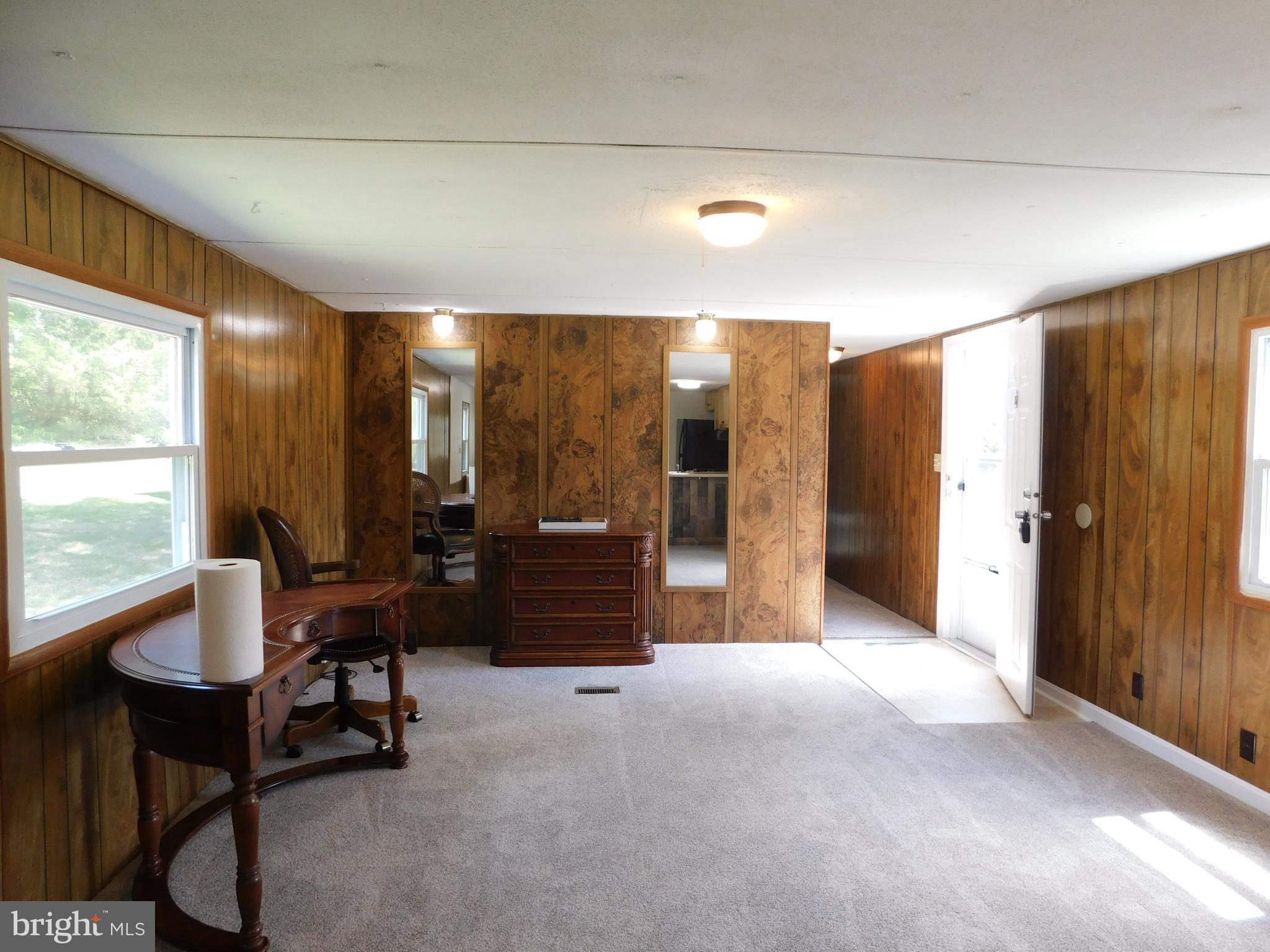 192 AA Rogers Road Augusta, WV 26704 - Photo 11 of 34 a living room with furniture and large windows