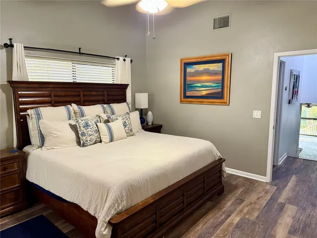 a bed room with bed and a table