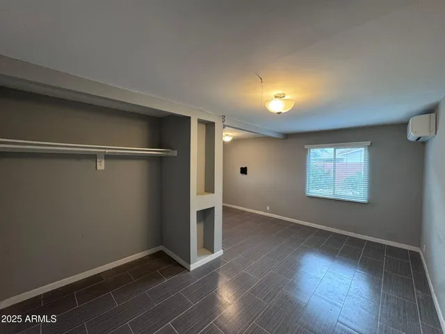 a view of a hallway with a window