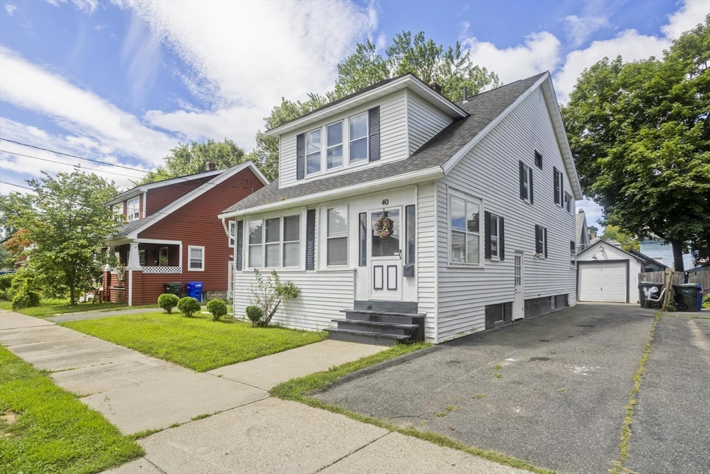 40 Eldridge Street Springfield, MA 01108 - Photo 2 of 22 a front view of a house with a yard