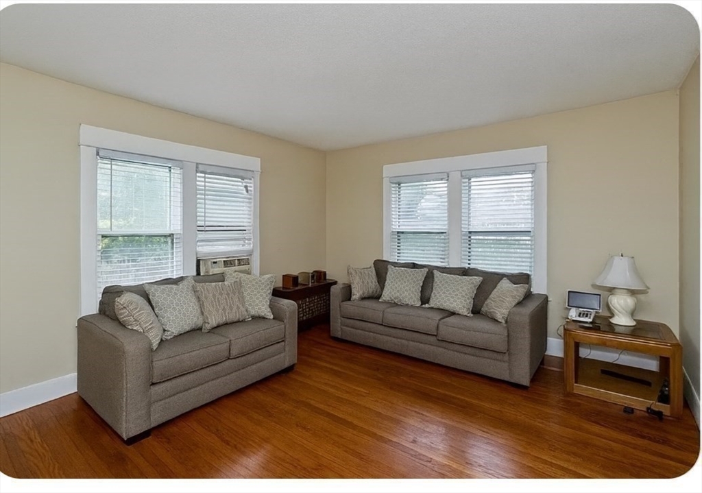 40 Eldridge Street Springfield, MA 01108 - Photo 9 of 22 a living room with furniture and a large window