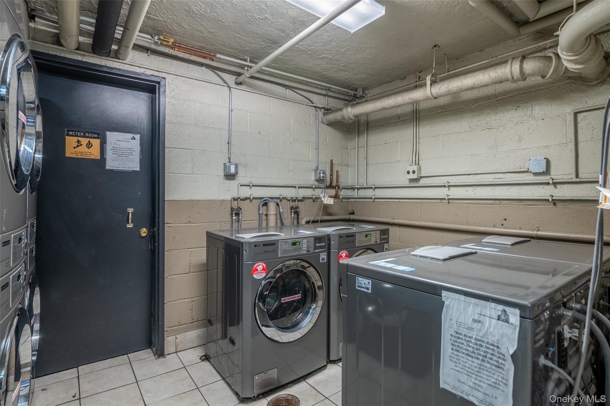 15 Lake Street, Unit 2D White Plains, NY 10603 - Photo 9 of 10 a utility room with dryer and washer