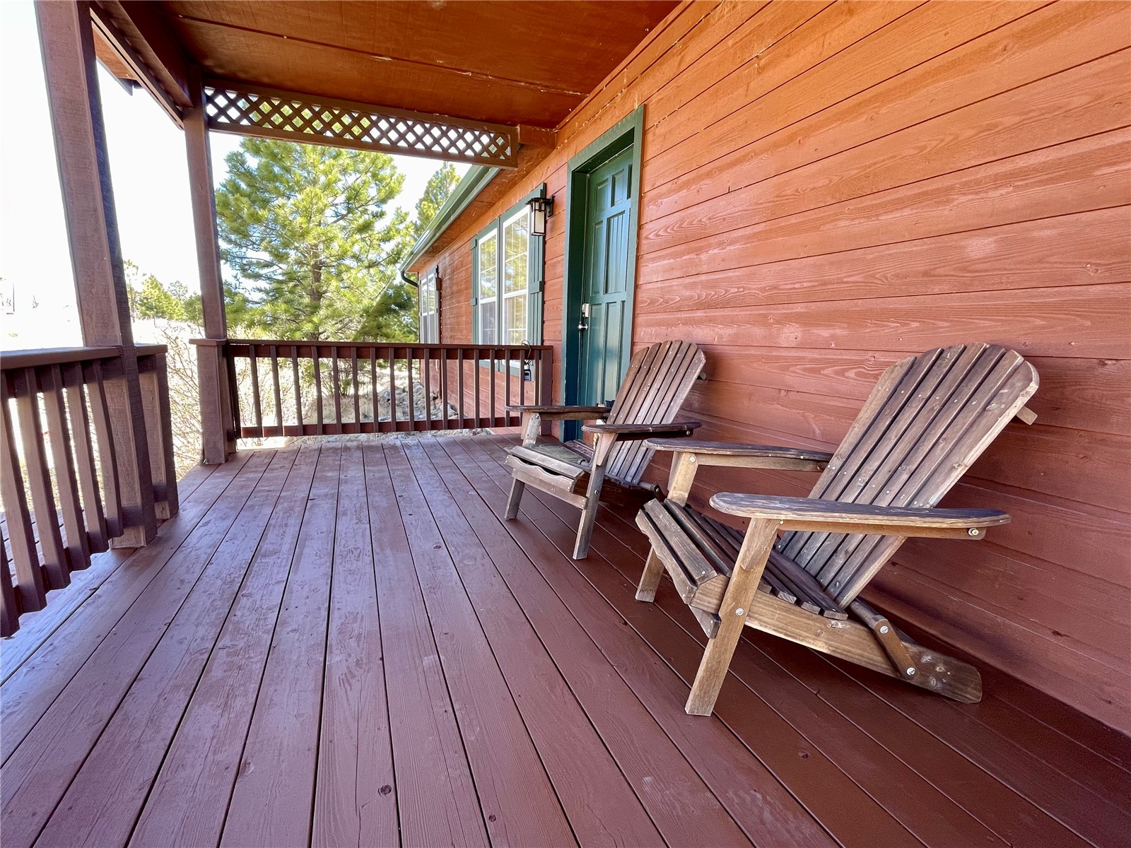1301 Sheep Ridge Road Fairplay, CO 80440 - Photo 38 of 49 Spacious wood-plank deck featuring a wood railing and lattice accents