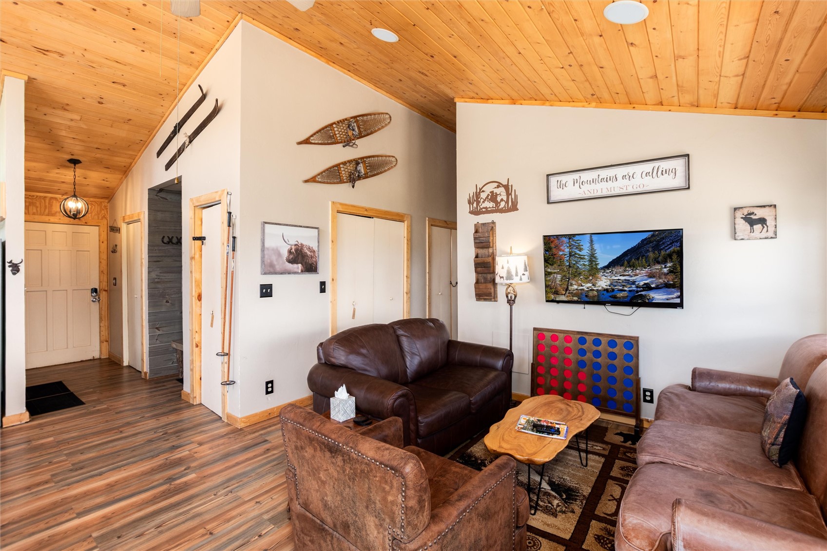 1301 Sheep Ridge Road Fairplay, CO 80440 - Photo 10 of 49 Living area featuring wood-finish flooring, a wood-paneled vaulted ceiling, and recessed lighting