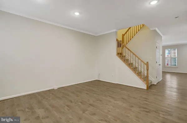 a kitchen with stainless steel appliances granite countertop a refrigerator sink and cabinets