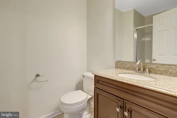 a bathroom with a sink a toilet and a bathtub