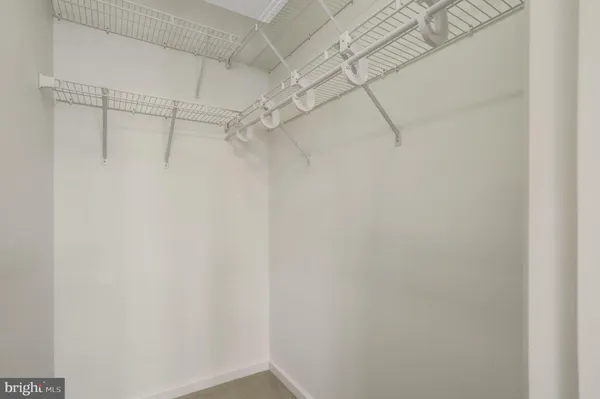 a view of a room with racks on the wall