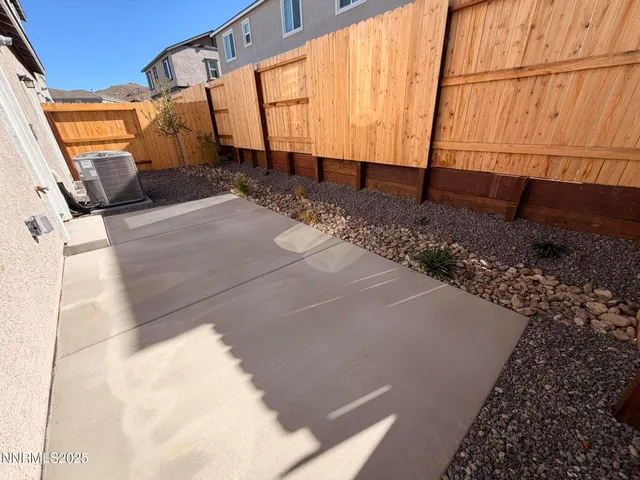 a view of a back yard of the house