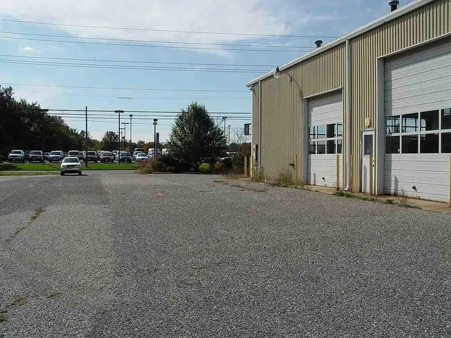 a view of a house with a street