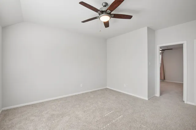 a view of house with backyard