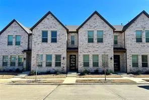 a view of a house with a street