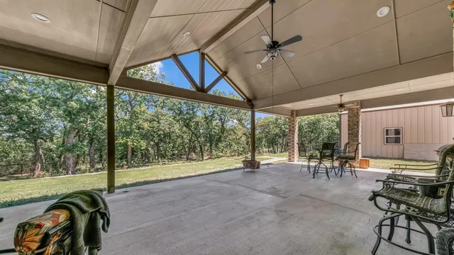 an outdoor view of the patio and dining space