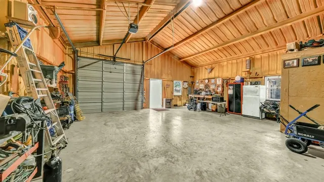 a bathroom with a sink mirror toilet and shower