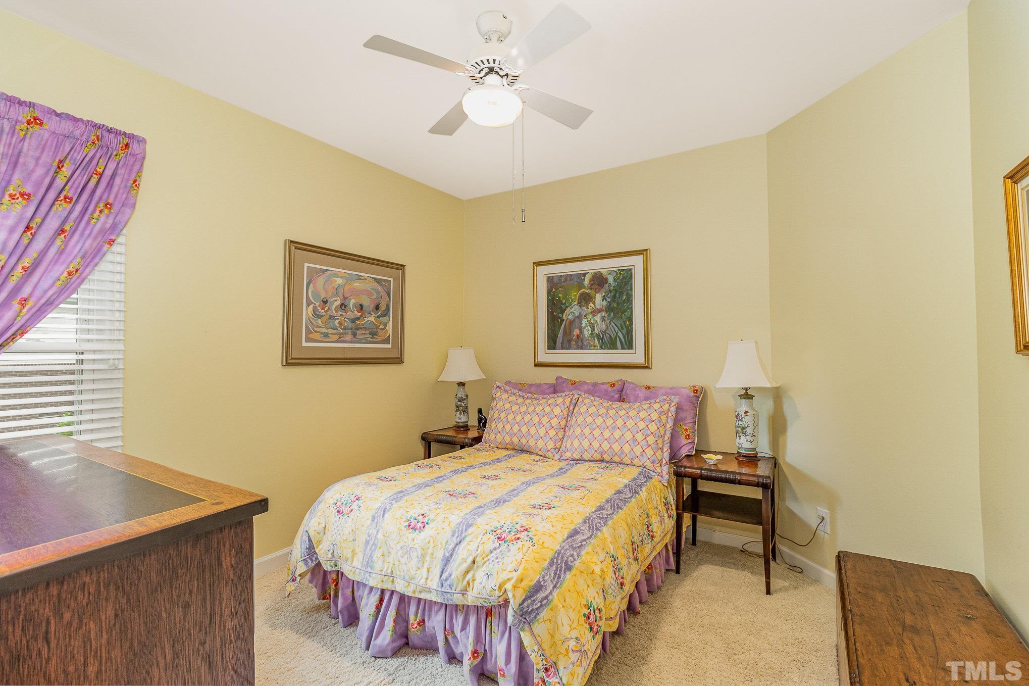 313 Boltstone Court Cary, NC 27513 - Photo 17 of 28 a bedroom with a bed and a desk
