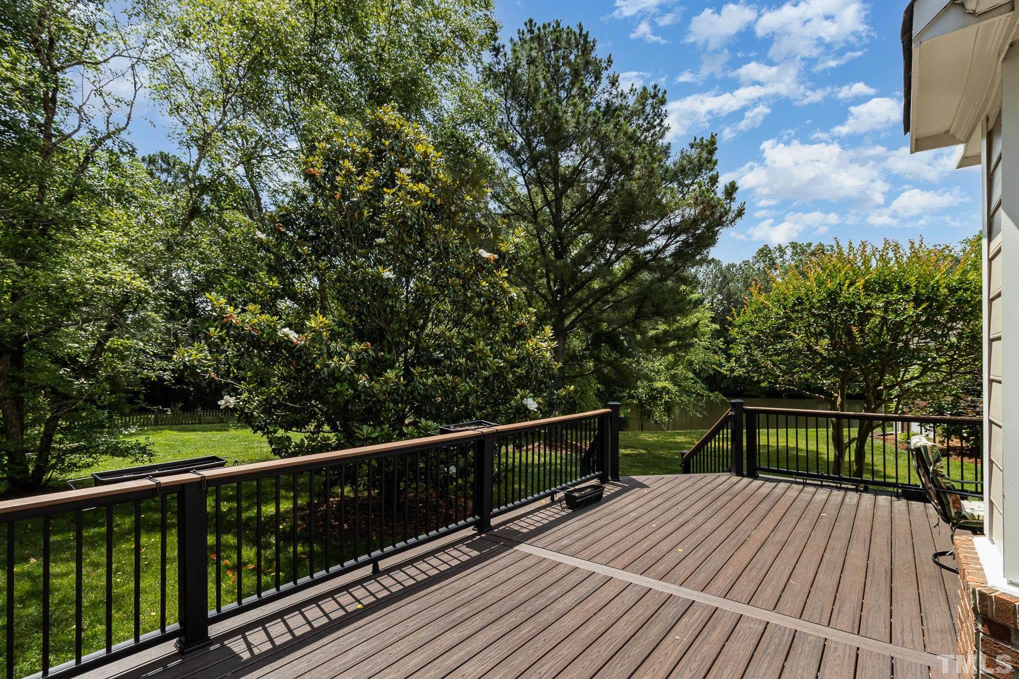 313 Boltstone Court Cary, NC 27513 - Photo 22 of 28 a view of balcony with wooden floor and fence
