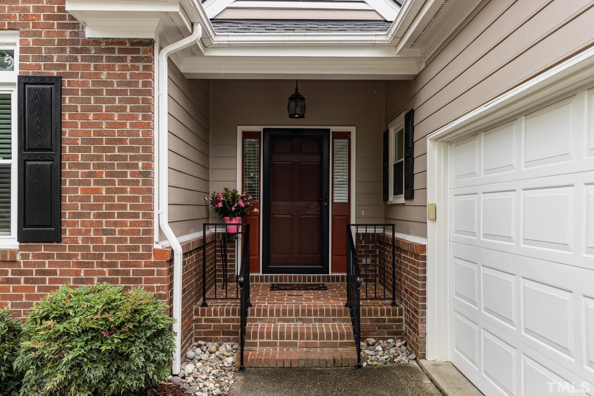 313 Boltstone Court Cary, NC 27513 - Photo 3 of 28 a view of front door of house