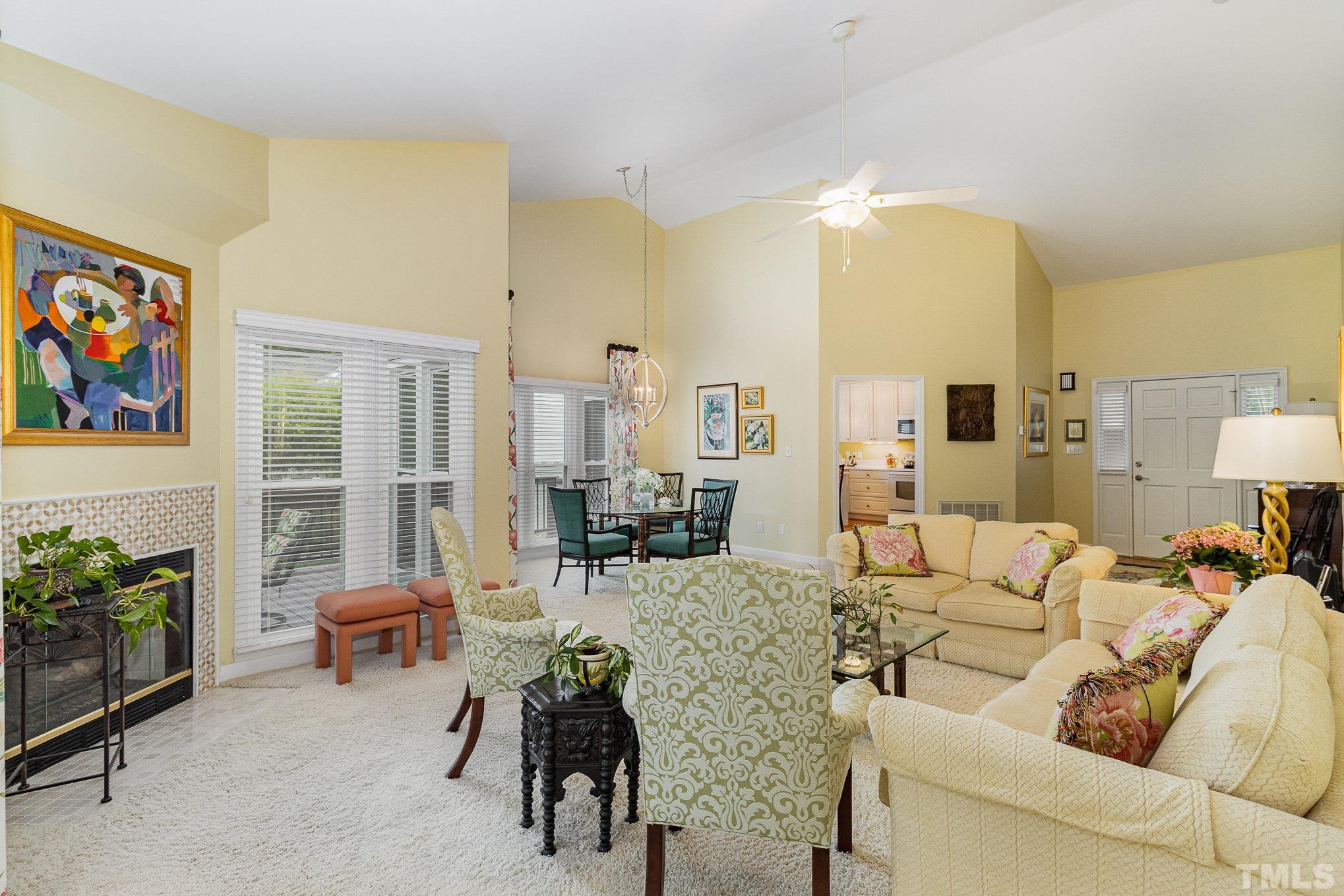 313 Boltstone Court Cary, NC 27513 - Photo 6 of 28 a living room with furniture and a fireplace