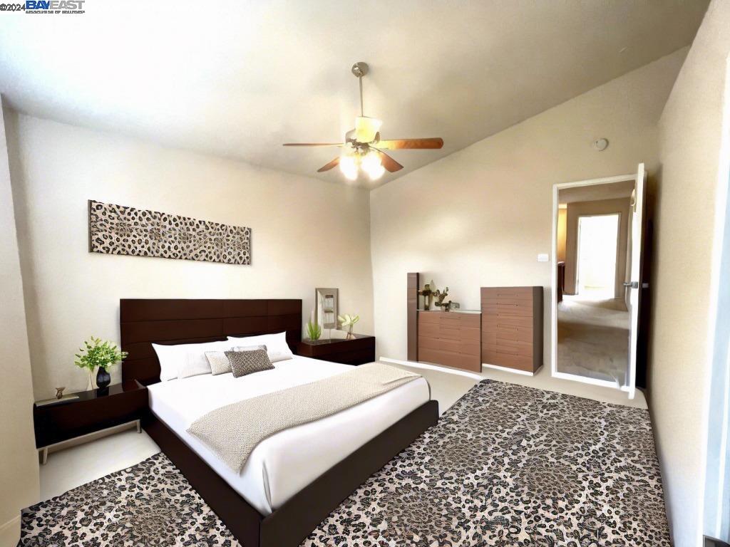 95377 Scott Tracy, CA 93577 - Photo 14 of 46 a bedroom with a bed and a chandelier