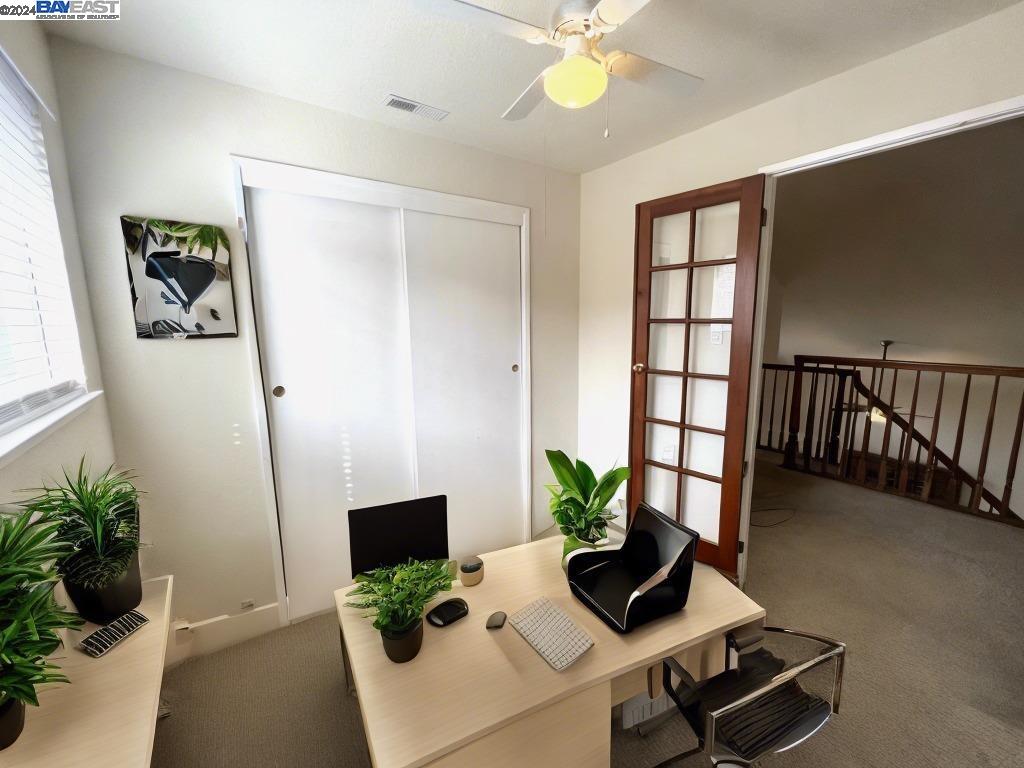95377 Scott Tracy, CA 93577 - Photo 24 of 46 a view of a workspace with furniture and a potted plant