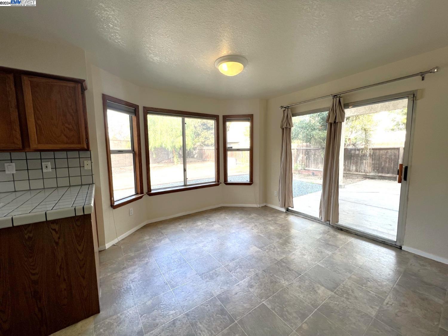 95377 Scott Tracy, CA 93577 - Photo 27 of 46 a view of an empty room with a window