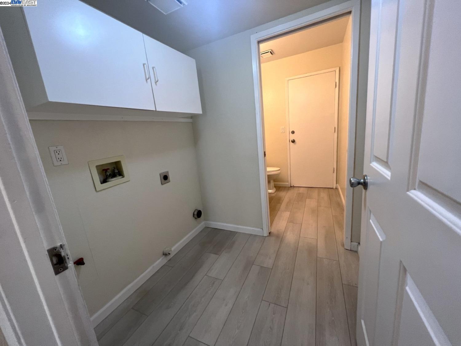 95377 Scott Tracy, CA 93577 - Photo 33 of 46 a view of room with wooden floor and cabinets